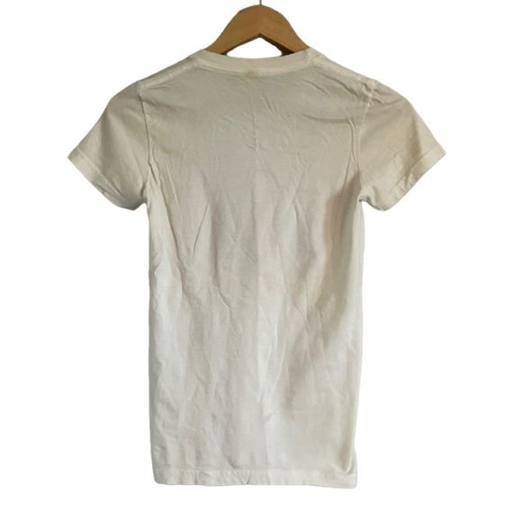 AMERICAN APPAREL Women’s THE TREWS GRAPHIC Cream Short Sleeve T-shirt Sm… - Picture 3 of 3